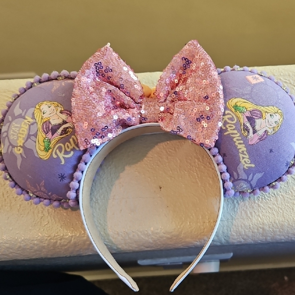 Disney Rapunzel Purple Pom-Pom Ears Headband with Pink Sequin Bow